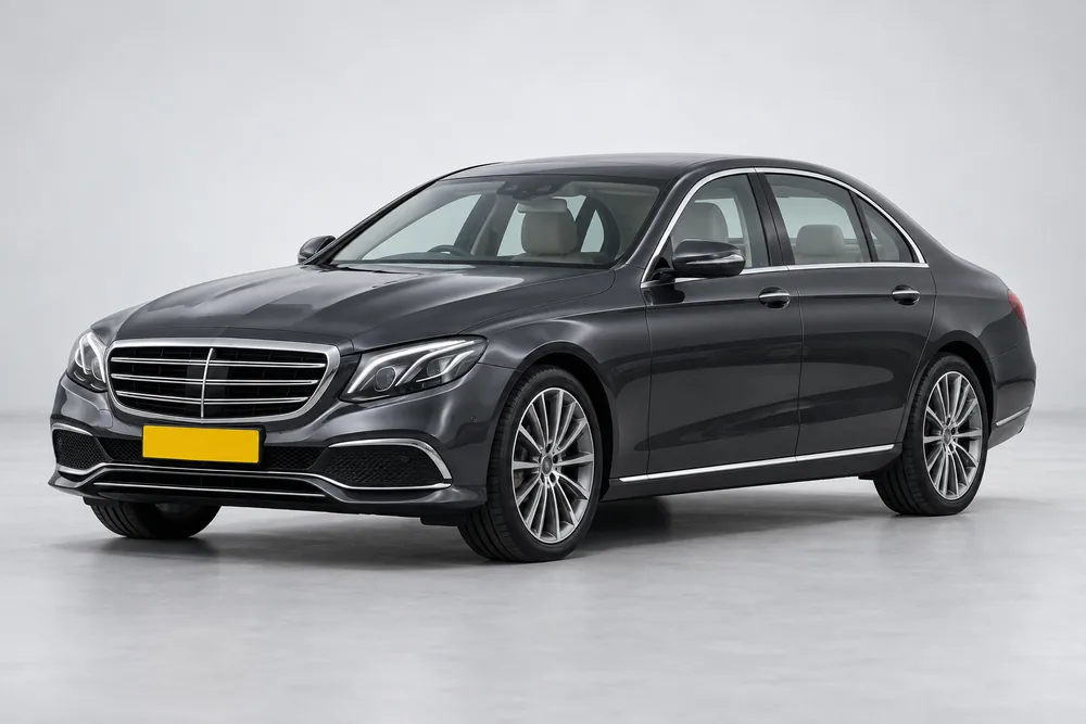 Illustrative charcoal executive saloon for the Benyva Luxury category.